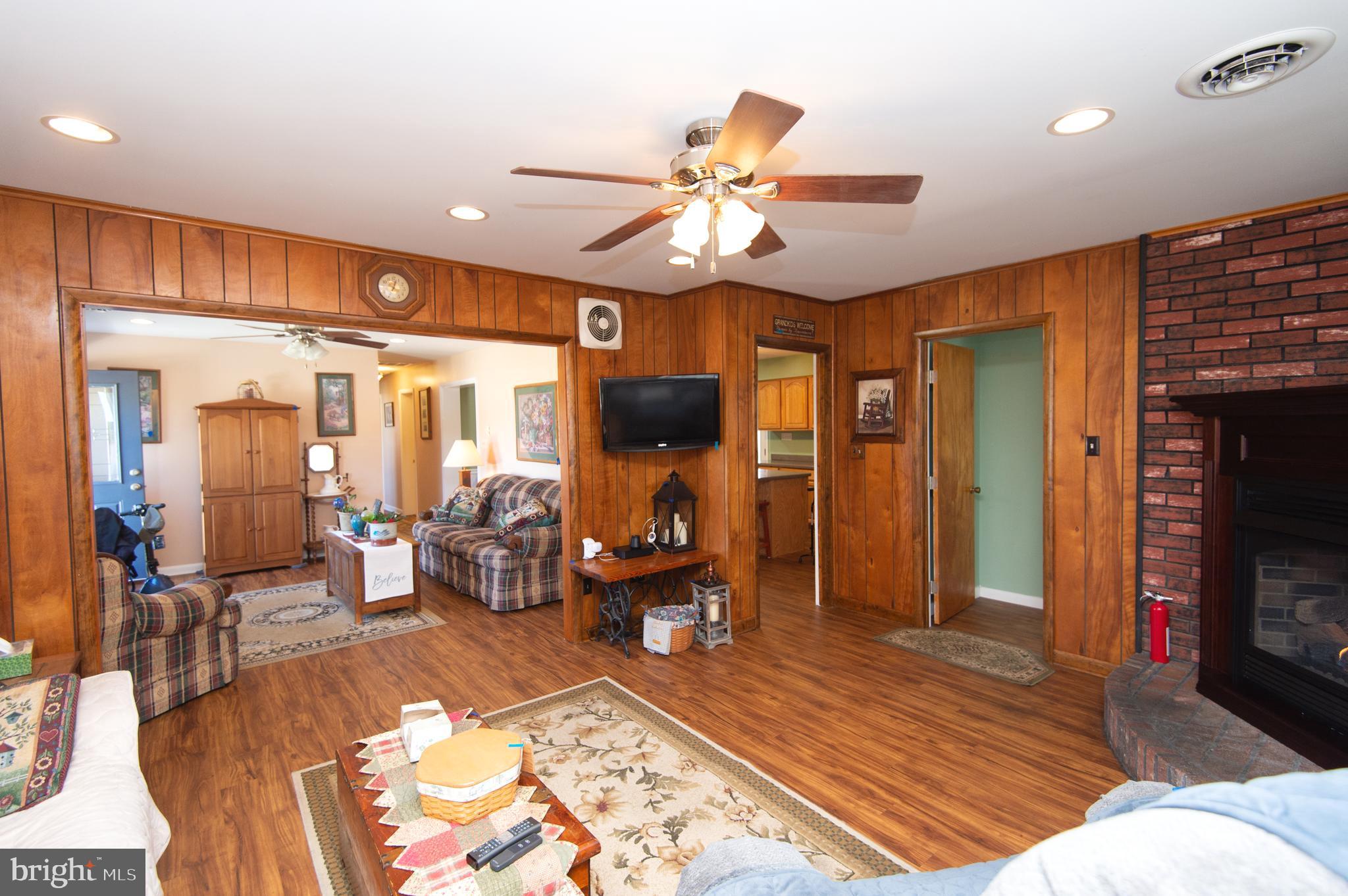 27113 Walnut Tree Road Salisbury, MD 21801 - Photo 11 of 58 Flow from the Living Room to the Family Room