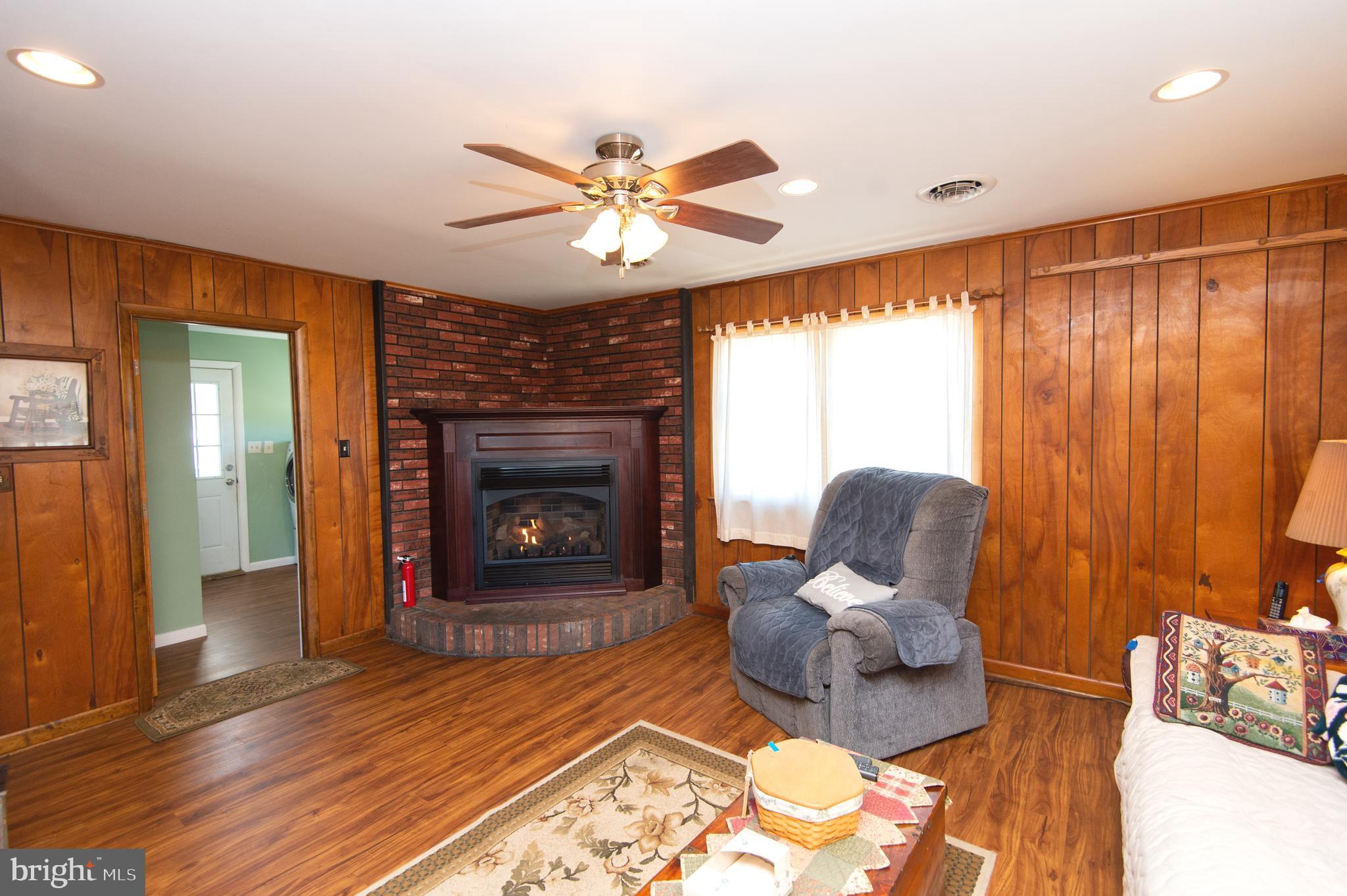 27113 Walnut Tree Road Salisbury, MD 21801 - Photo 14 of 58 Family Room - Cozy up by the Fireplace