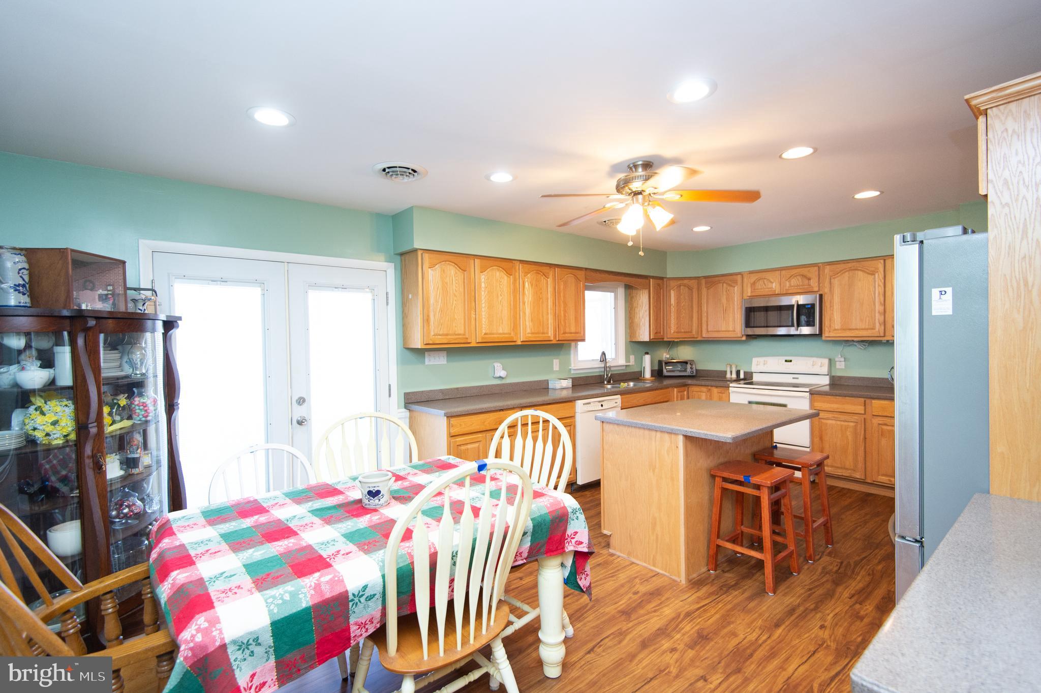 27113 Walnut Tree Road Salisbury, MD 21801 - Photo 21 of 58 Dining Area with Doors to Porch & Deck