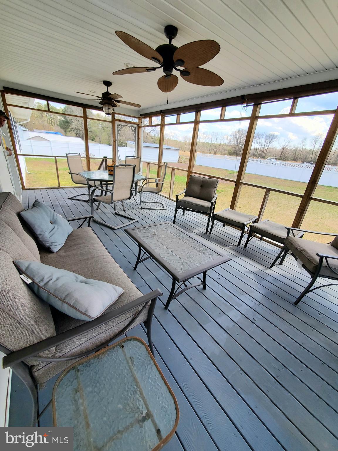 27113 Walnut Tree Road Salisbury, MD 21801 - Photo 45 of 58 Screened Porch - Plenty of Room for Entertaining