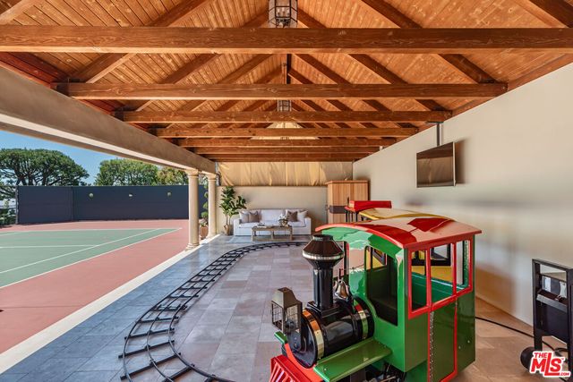 a view of a storage in a room with wooden walls