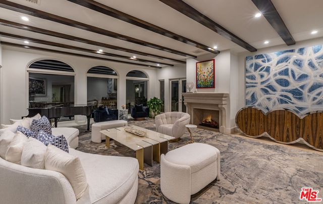 a kitchen with stainless steel appliances kitchen island granite countertop a sink and cabinets
