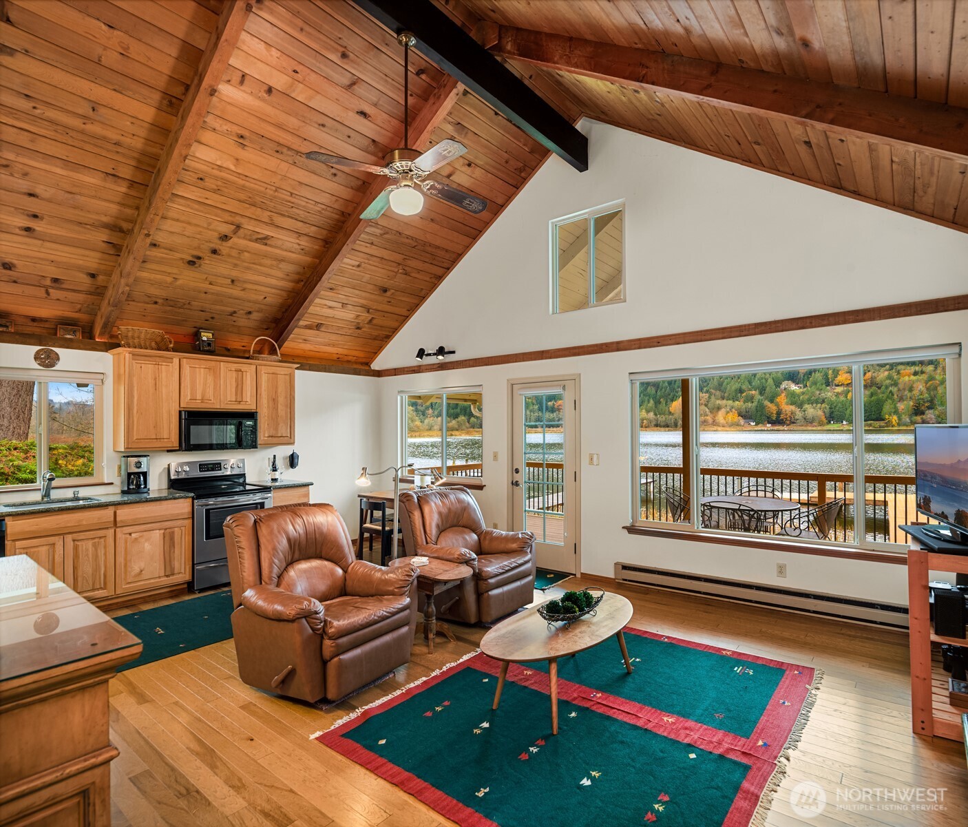 19110 Sulfur Springs Road Mount Vernon, WA 98274 - Photo 12 of 33 a living room with fireplace furniture and a large window