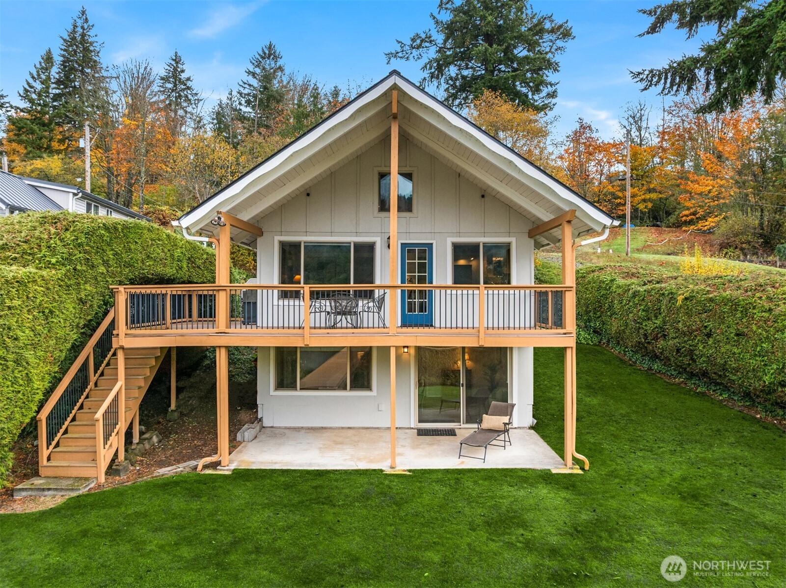 19110 Sulfur Springs Road Mount Vernon, WA 98274 - Photo 2 of 33 a front view of a house with a yard and potted plants