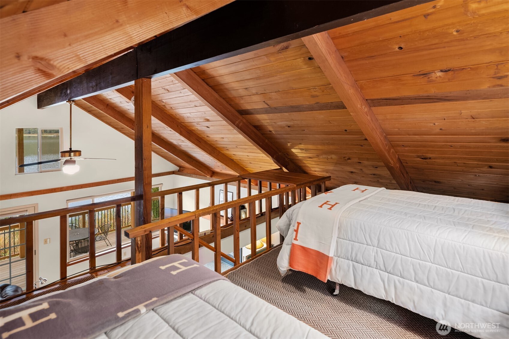 19110 Sulfur Springs Road Mount Vernon, WA 98274 - Photo 23 of 33 a bedroom with a bed and wooden floor