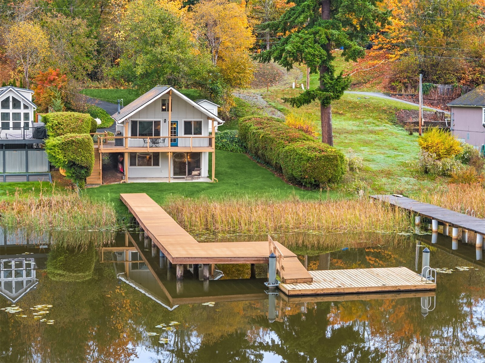 19110 Sulfur Springs Road Mount Vernon, WA 98274 - Photo 32 of 33 a small white house with a lake view