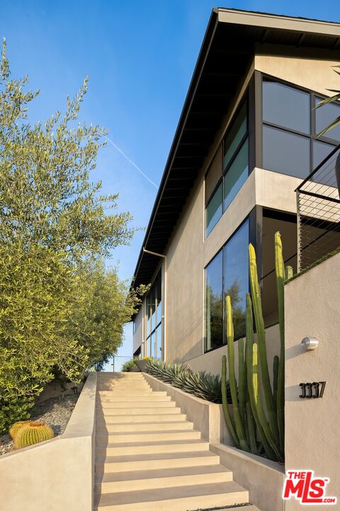 3337 Beverly Ranch Road Beverly Hills, CA 90210 - Photo 3 of 39 a view of a house with a door