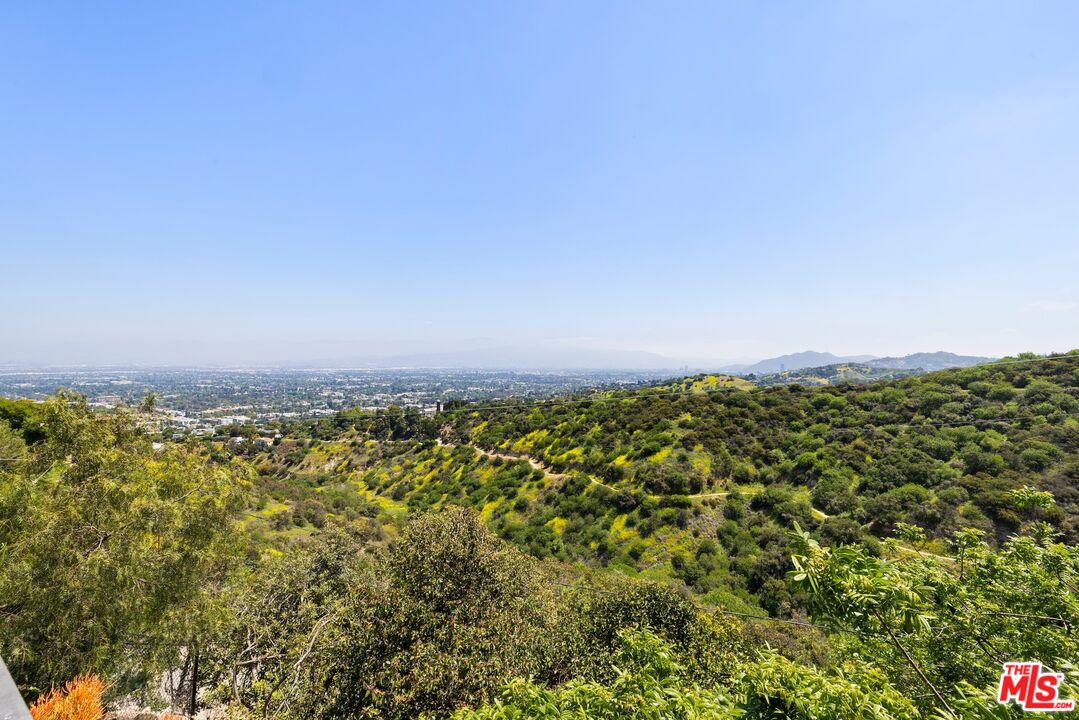 3337 Beverly Ranch Road Beverly Hills, CA 90210 - Photo 32 of 39 a view of a large building with a yard