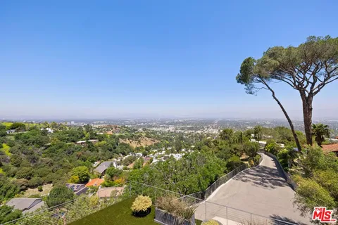 a view of a city with an ocean