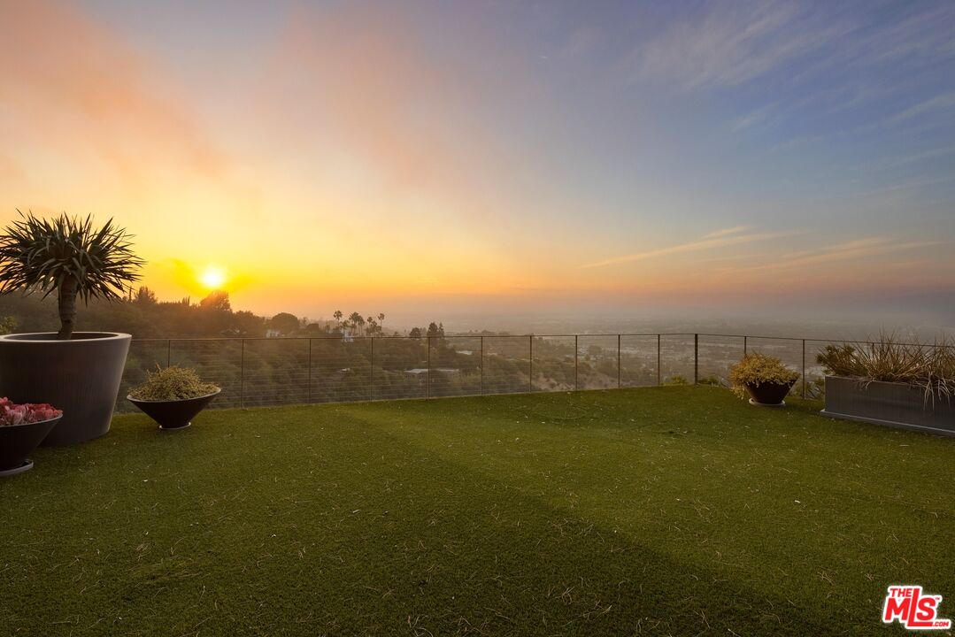 3337 Beverly Ranch Road Beverly Hills, CA 90210 - Photo 37 of 39 a view of a lake with a mountain in the background