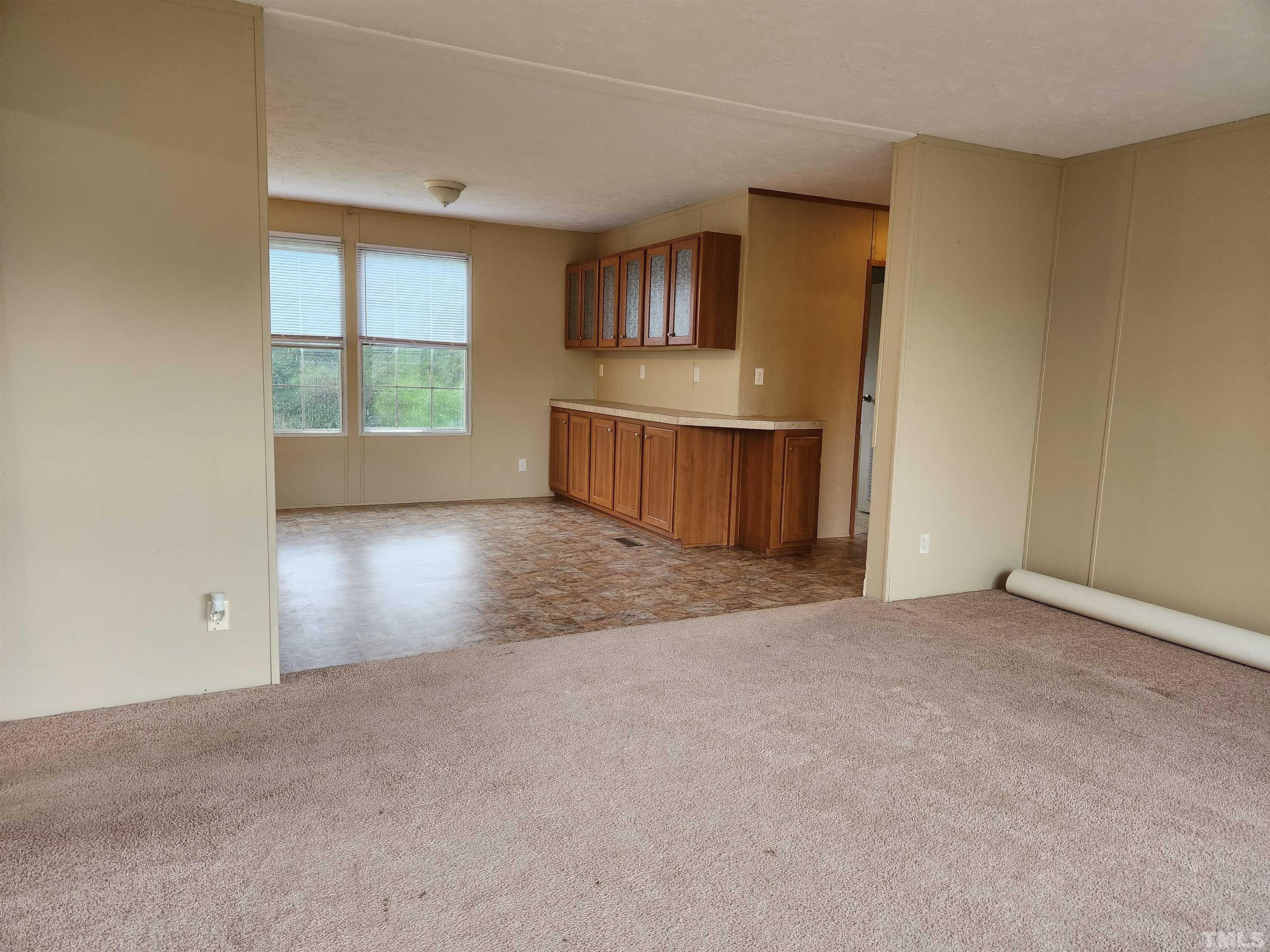 555 Massengill Pond Road Angier, NC 27501 - Photo 12 of 36 a view of an empty room with a window