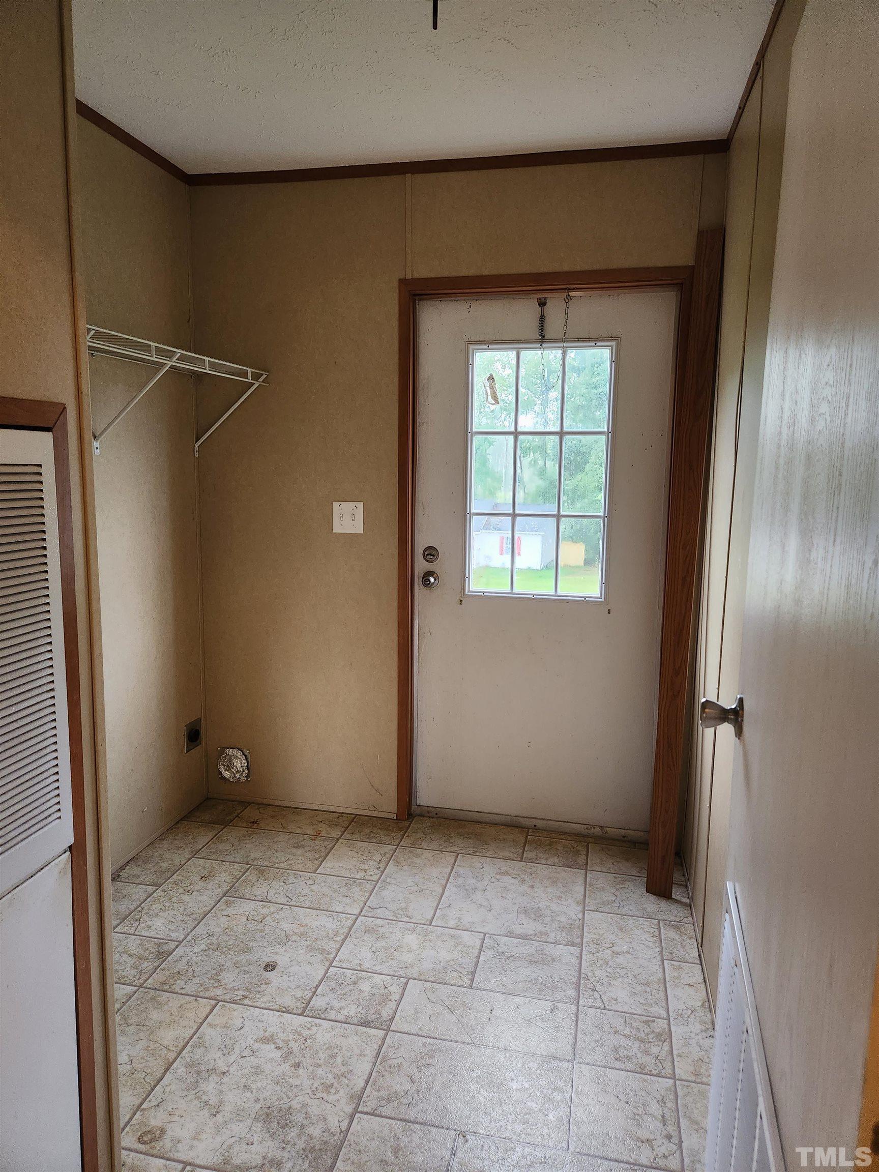 555 Massengill Pond Road Angier, NC 27501 - Photo 24 of 36 a view of an empty room with a window