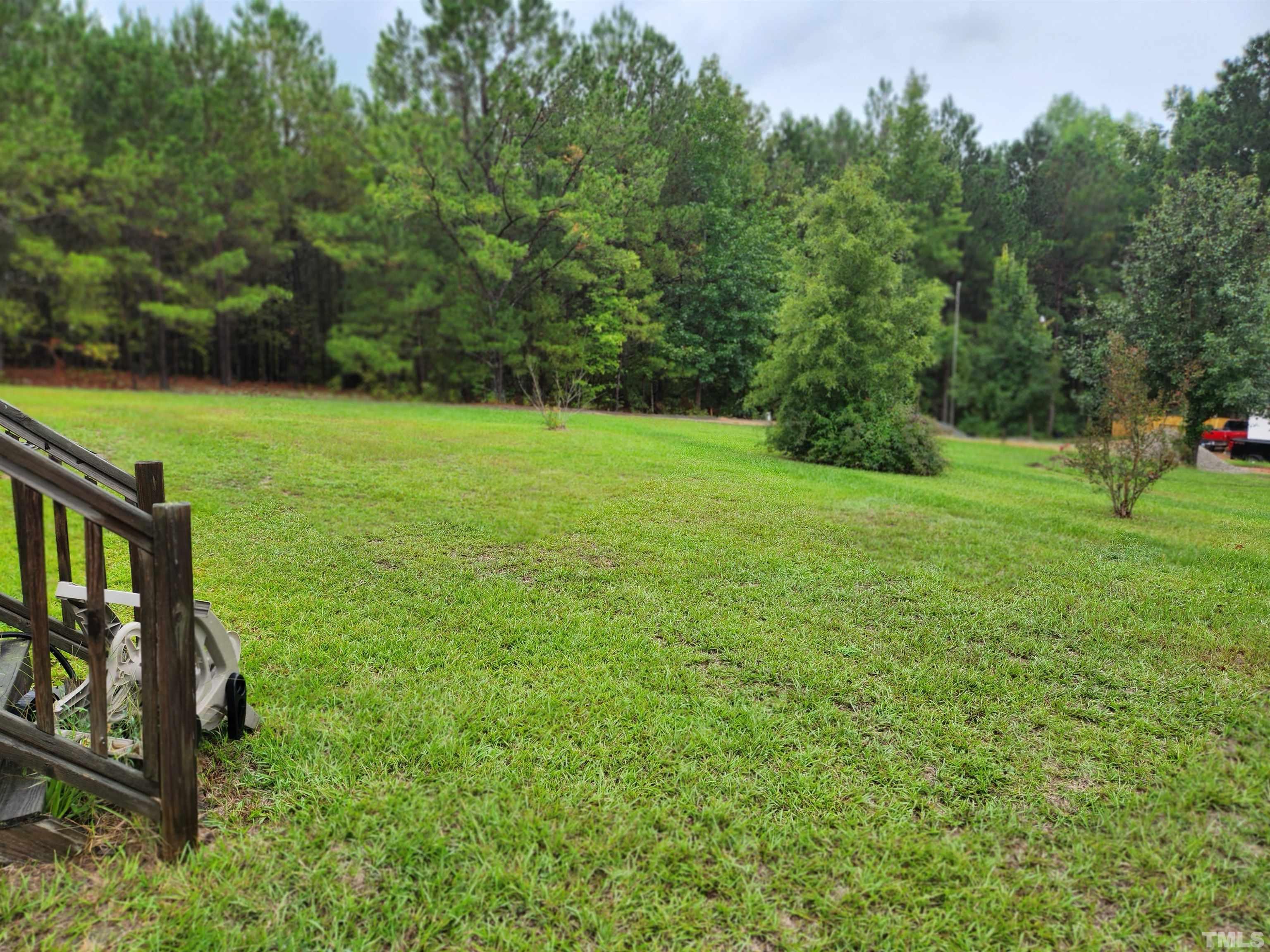 555 Massengill Pond Road Angier, NC 27501 - Photo 7 of 36 a view of outdoor space with deck and yard