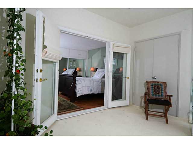 2364 Torrey Pines Road, Unit 35 La Jolla, CA 92037 - Photo 14 of 19 VIEW OF MASTER BEDROOM FROM PATIO