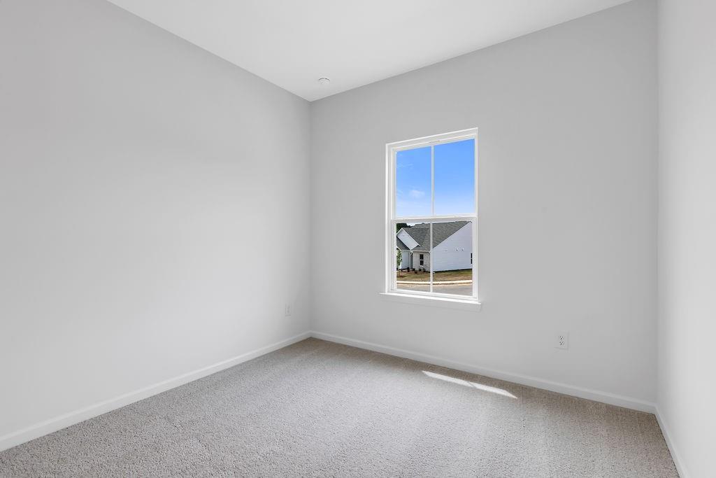 172 Sweet Water Lane Southeast Rome, GA 30161 - Photo 23 of 29 an empty room with a window
