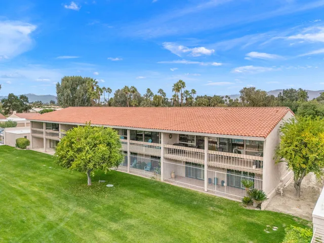 a garden view with a sitting space