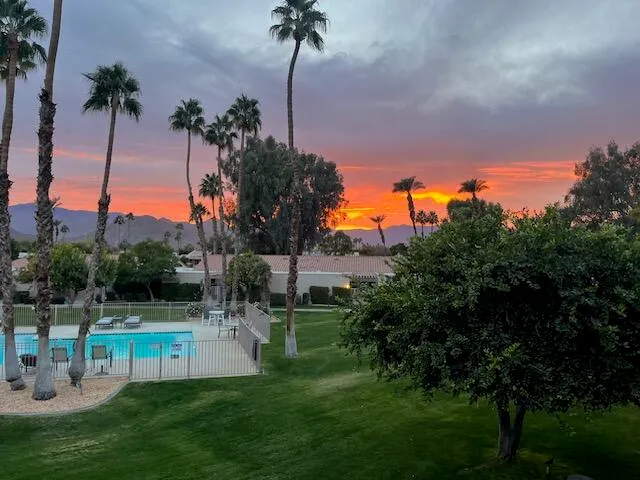 a view of a backyard of a house