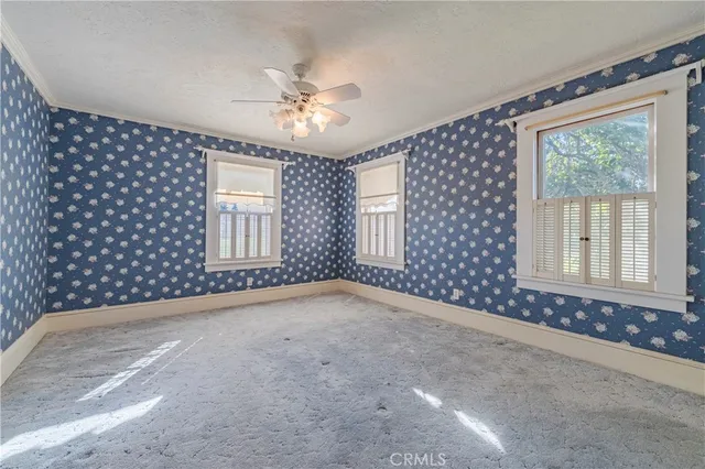 a view of a livingroom with a large window