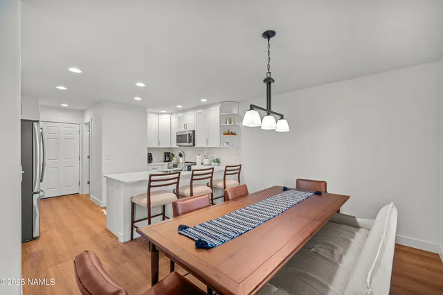 a view of a dining room with furniture