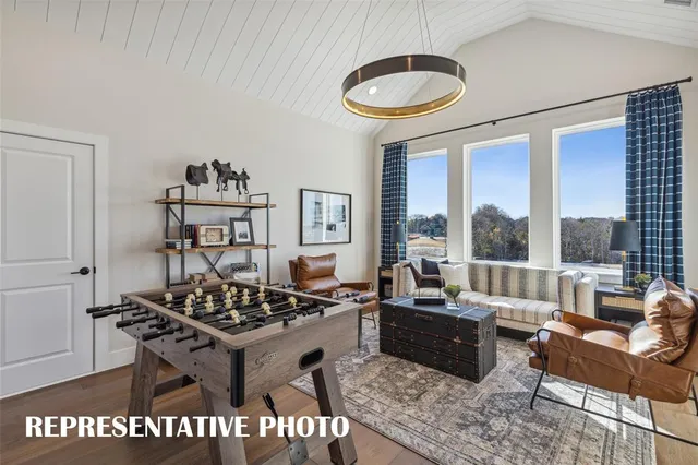 a spacious bedroom with a large bed and a couch