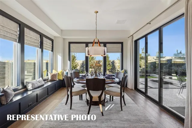a living room with furniture wooden floor and a chandelier