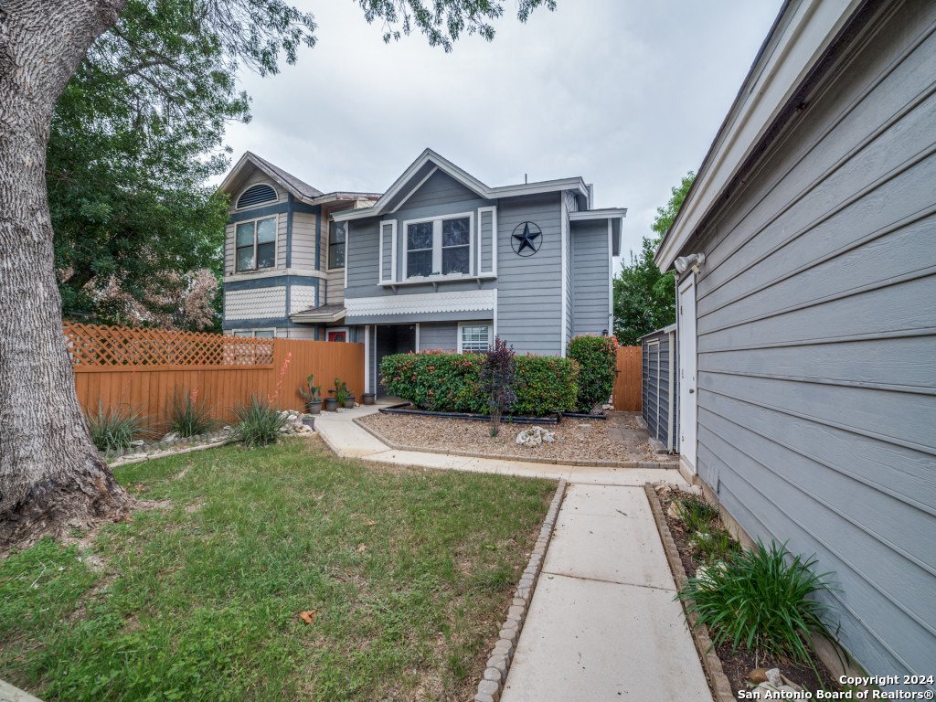 6706 Spring Front Drive San Antonio, TX 78249 - Photo 1 of 1 a view of a yard in front of house