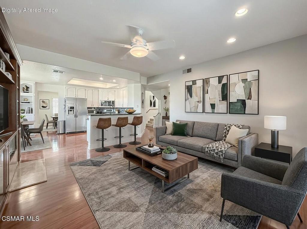 7204 University Drive Moorpark, CA 93021 - Photo 11 of 57 a living room with furniture and kitchen view