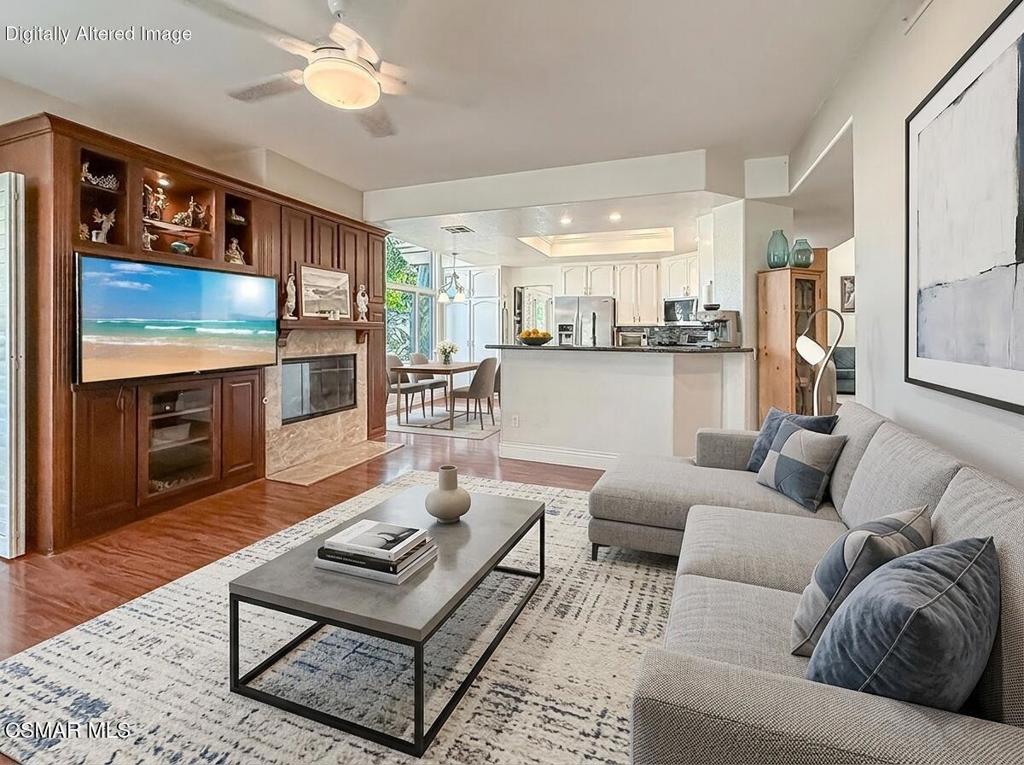 7204 University Drive Moorpark, CA 93021 - Photo 13 of 57 a living room with furniture and a fireplace
