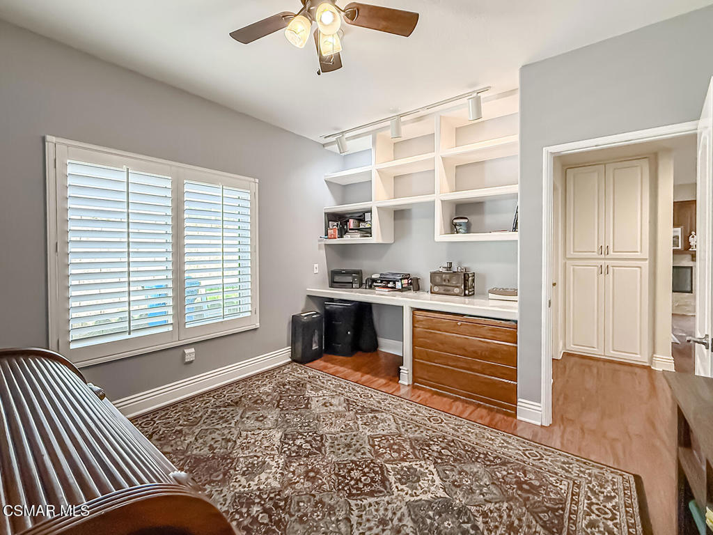 7204 University Drive Moorpark, CA 93021 - Photo 21 of 57 a bedroom with a bed and a window