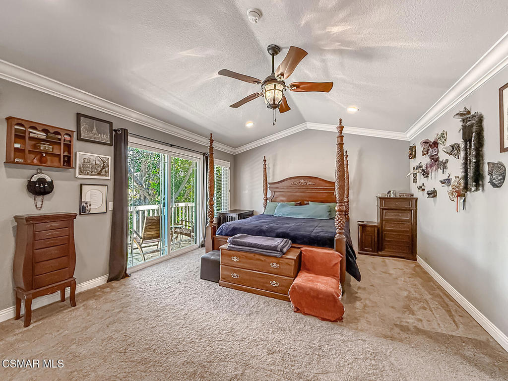 7204 University Drive Moorpark, CA 93021 - Photo 26 of 57 a bedroom with a large bed and a window