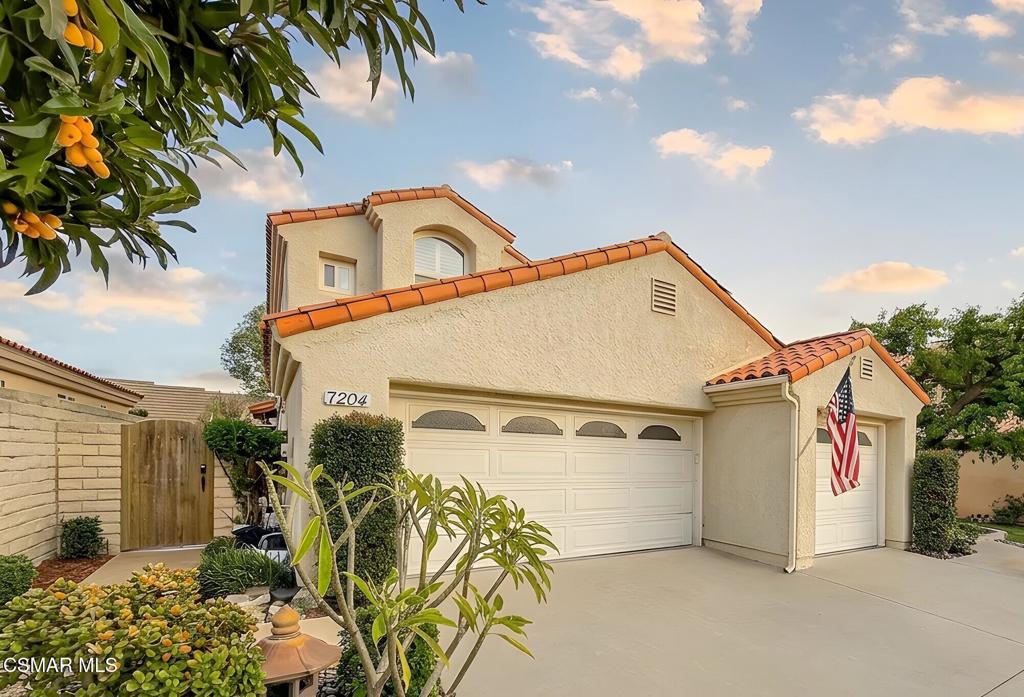 7204 University Drive Moorpark, CA 93021 - Photo 3 of 57 a view of a house with a garage