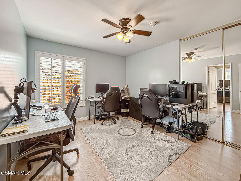 7204 University Drive Moorpark, CA 93021 - Photo 35 of 57 a view of a workspace with furniture and a window