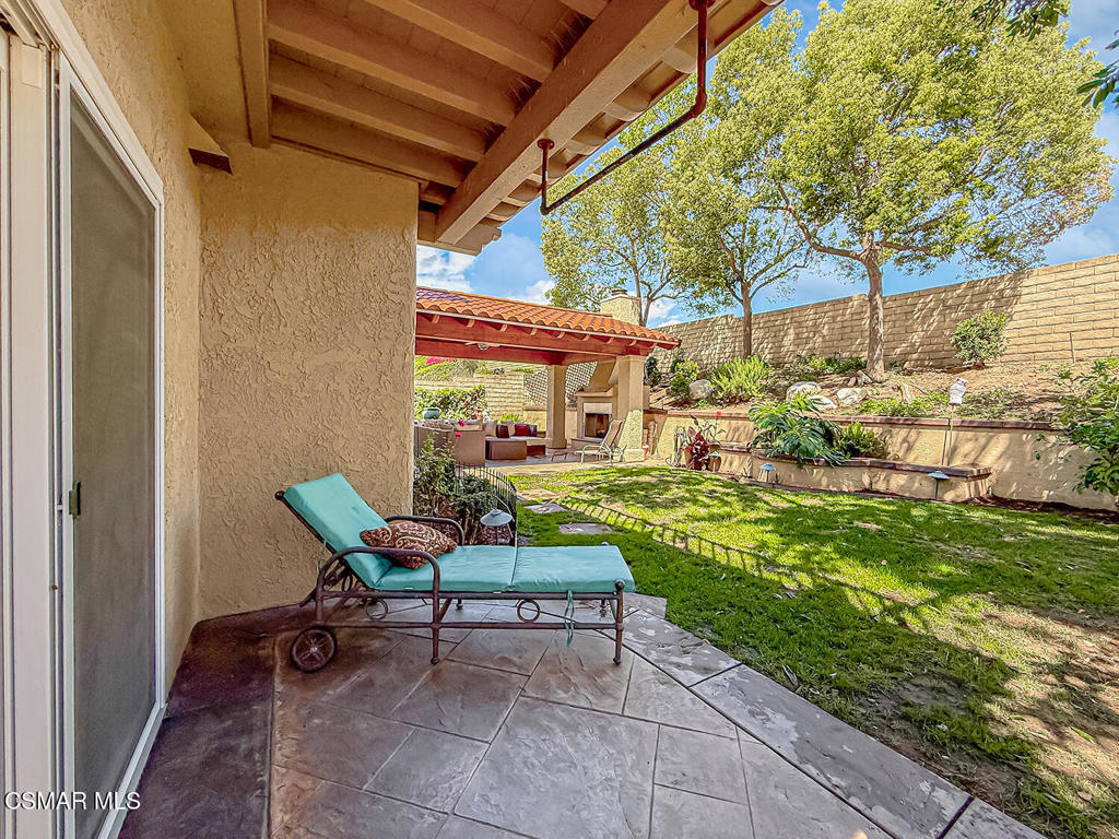 7204 University Drive Moorpark, CA 93021 - Photo 45 of 57 a backyard of a house with table and chairs