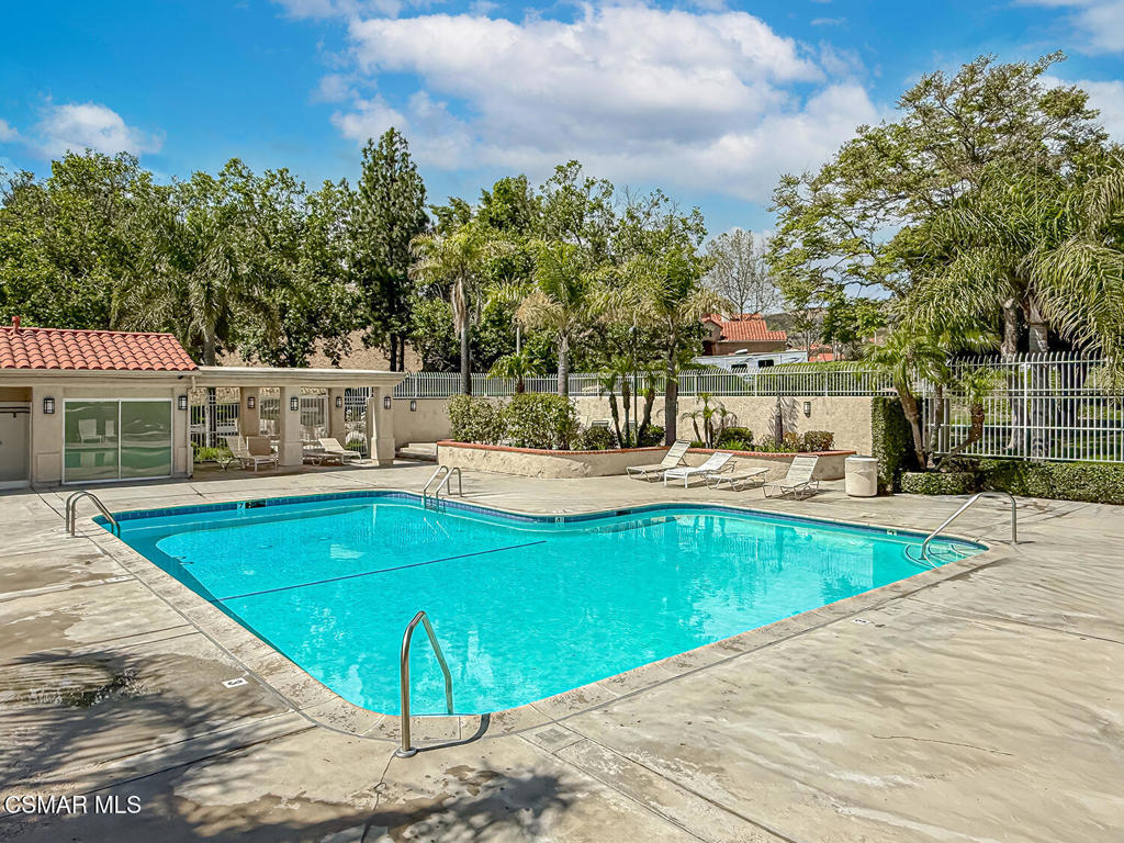 7204 University Drive Moorpark, CA 93021 - Photo 50 of 57 a view of a swimming pool with a patio