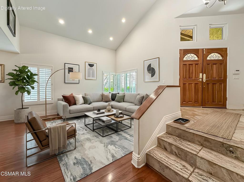 7204 University Drive Moorpark, CA 93021 - Photo 5 of 57 a living room with furniture and wooden floor