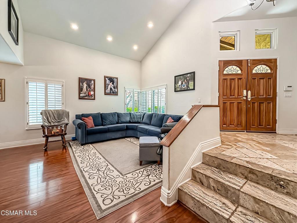 7204 University Drive Moorpark, CA 93021 - Photo 6 of 57 a living room with furniture and a wooden floor