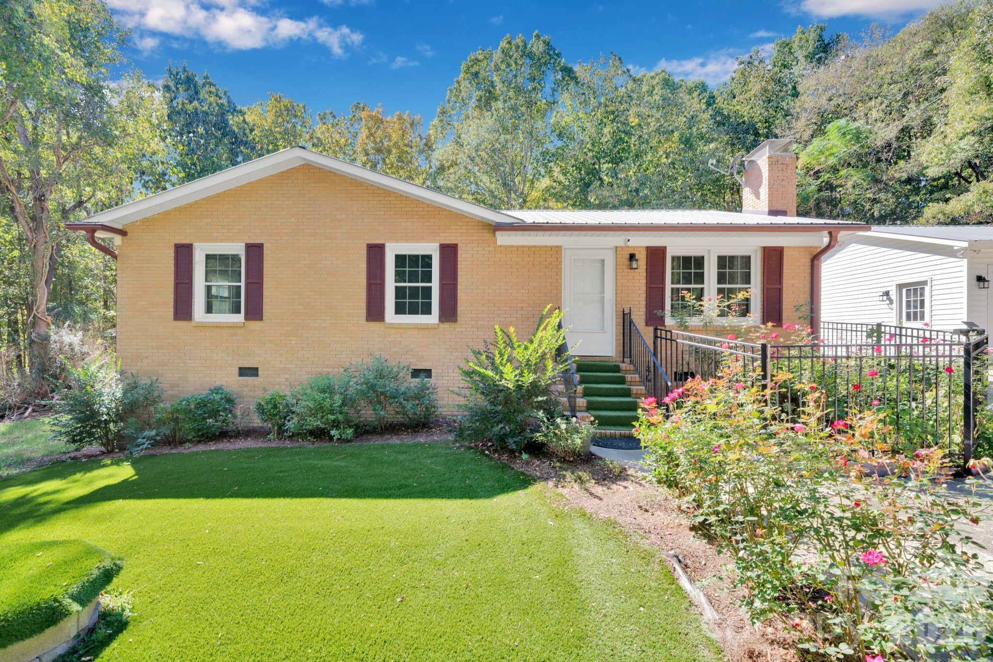 a house view with a garden space