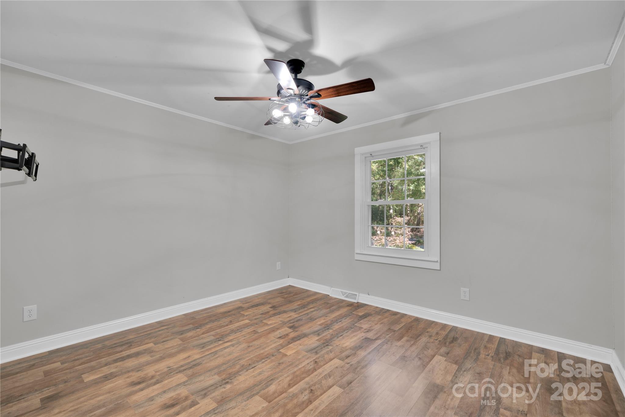 4612 Huggins Road Marshville, NC 28103 - Photo 12 of 37 wooden floor in an empty room with a window