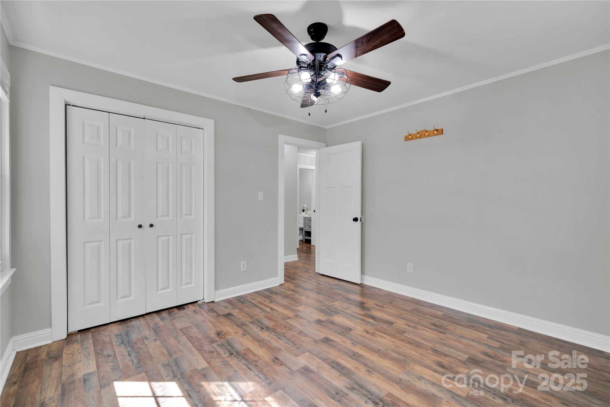 4612 Huggins Road Marshville, NC 28103 - Photo 15 of 37 a view of an empty room and wooden floor