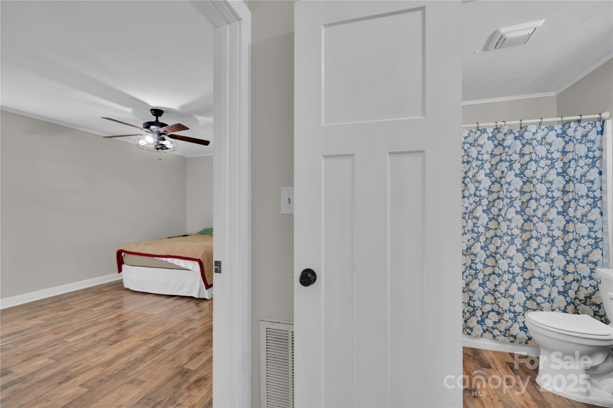 4612 Huggins Road Marshville, NC 28103 - Photo 16 of 37 a bathroom with a toilet and a shower