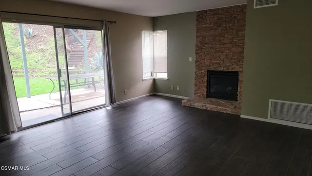 a view of a hallway view with staircase