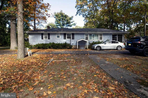 front view of house with a yard