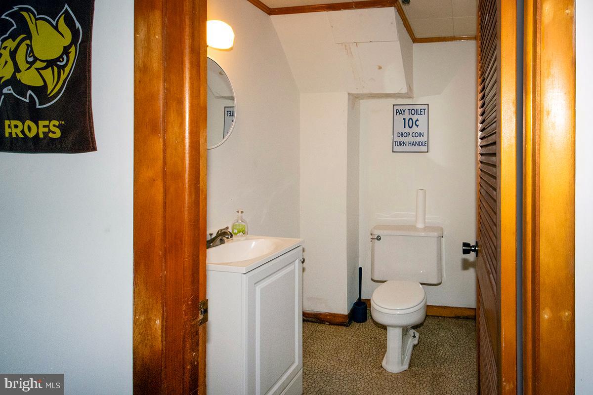 412 Swarthmore Road Glassboro, NJ 08028 - Photo 13 of 50 a bathroom with a sink and a toilet