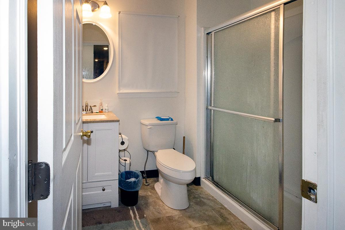 412 Swarthmore Road Glassboro, NJ 08028 - Photo 14 of 50 a bathroom with a toilet and a sink