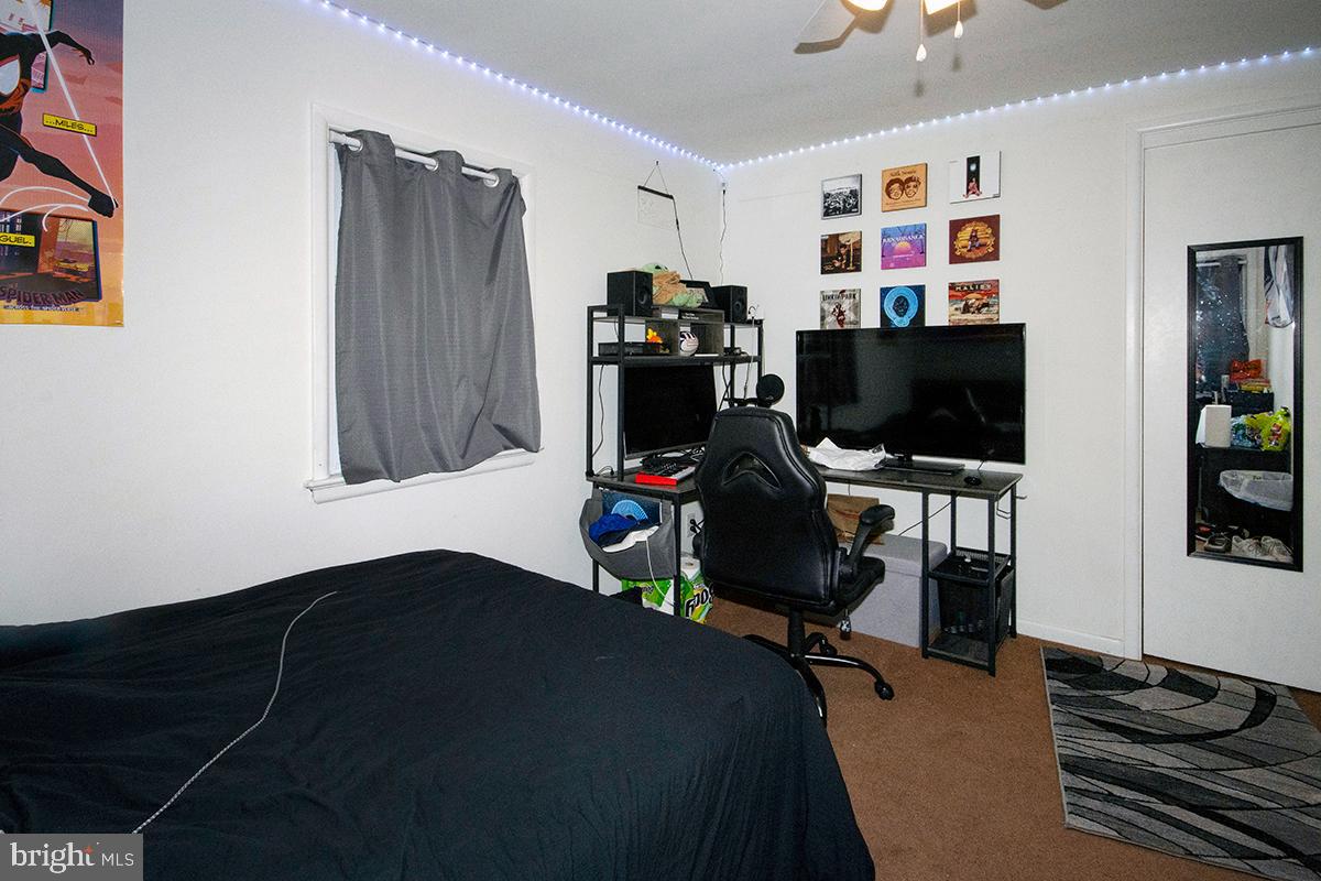 412 Swarthmore Road Glassboro, NJ 08028 - Photo 26 of 50 a view of a workspace with furniture and a window