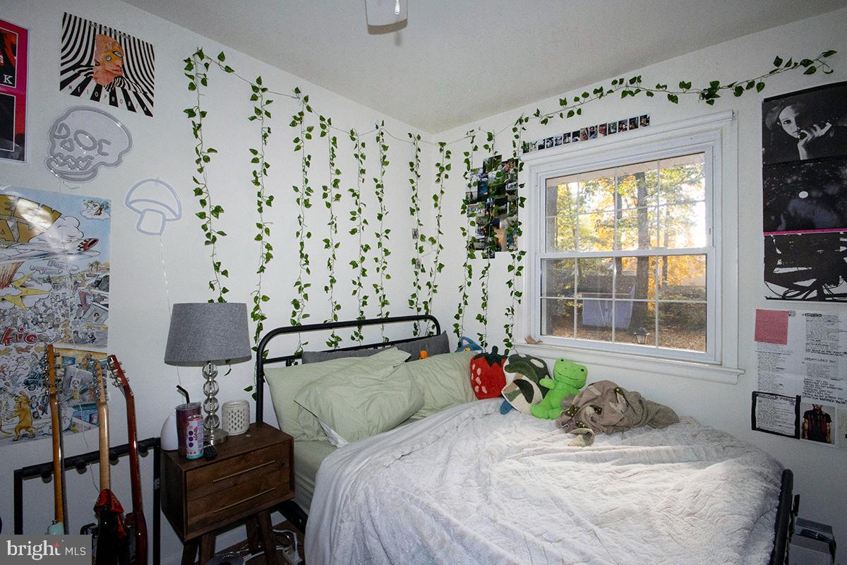 412 Swarthmore Road Glassboro, NJ 08028 - Photo 31 of 50 a bedroom with a bed and a window