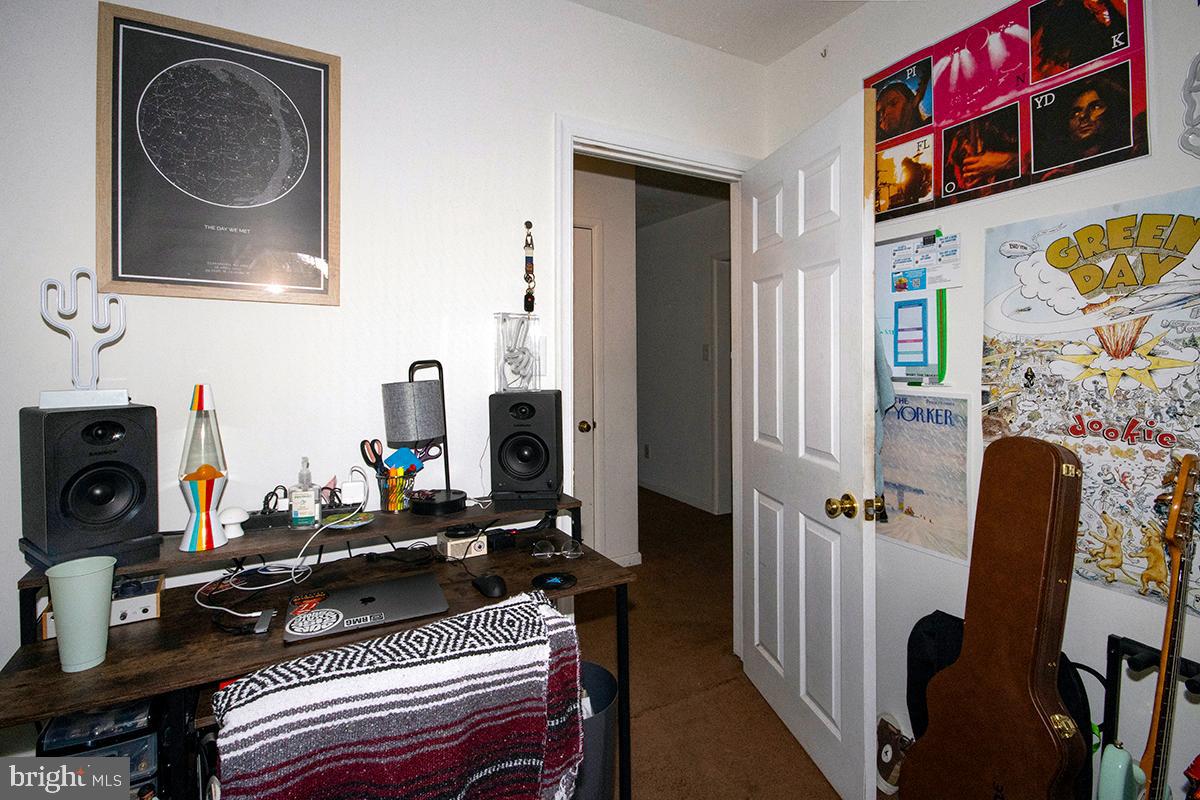 412 Swarthmore Road Glassboro, NJ 08028 - Photo 32 of 50 a room with furniture and flat screen tv