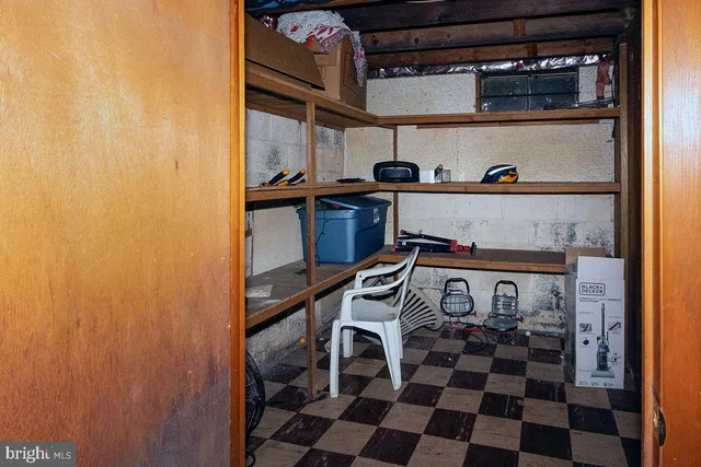 a kitchen with a stove a sink and a microwave