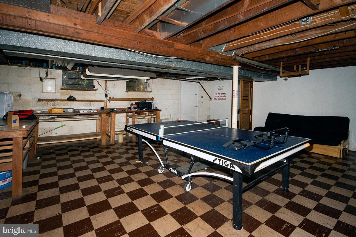 412 Swarthmore Road Glassboro, NJ 08028 - Photo 35 of 50 a kitchen with a stove a sink and a microwave