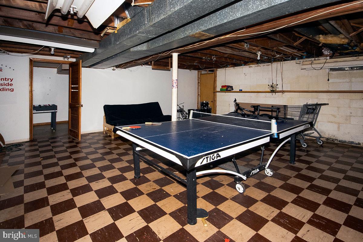 412 Swarthmore Road Glassboro, NJ 08028 - Photo 36 of 50 a view of a terrace with a table and chairs